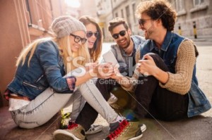 stock-photo-40464898-friends-looking-at-mobile-phone
